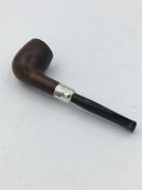 A gentleman's pipe with a silver mount