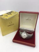 A Stainless steel Omega in original box and with paper work.