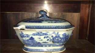 A Blue and white Oriental tureen with lid with repair AF.