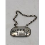 A Hallmarked silver 'Madeira' Decanter label.