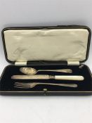 A hallmarked silver boxed set of knife fork and spoon.