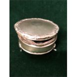 A silver three legged dish with lid, engraved AF