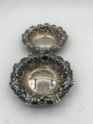 A pair of two small hallmarked silver pin dishes.