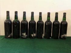 Eight bottles of 1963 Taylors Vintage Port