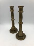 Two brass modern candlesticks