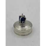 A Silver pill box with crown pincushion to the Lid.