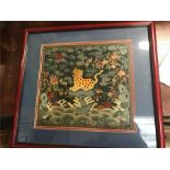 An Antique Chinese embroidered silk depicting a Leopard
