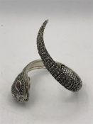 A Very unusual silver and Marcasite snake bangle set with watch to the head and ruby eyes