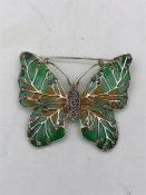 A Silver and Plique A Jour Butterfly Brooch