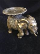 An elephant candlestick stand