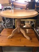 A small pine round table