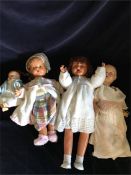 A selection of four Vintage Dolls. One 23cm tall, individually jointed with sound box in back (not