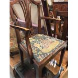 A Mahogany carver chair with petit point upholstered seta in manner of a mediaeval scene featuring a
