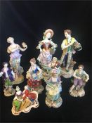 Nine Porcelain Sitzendorf figures