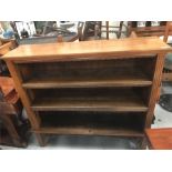 A Walnut open bookcase with adjustable shelves
