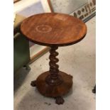 A Mahogany wine table with barley twist stem and claw feet