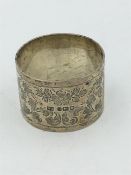 A hallmarked silver napkin ring