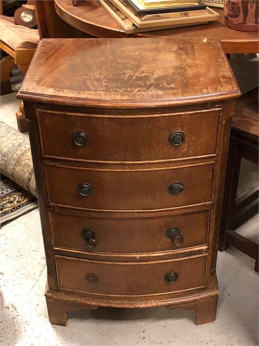 A Four drawer bedside table