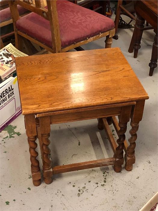 A nest of two tables with barley twist legs