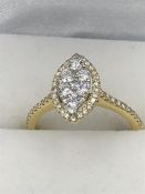 A Good 18ct yellow gold diamond cluster ring of 55 points