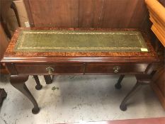 A Sofa or console table with green leather top and two drawers