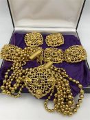 A Vintage Christian Dior jewellery set to include necklace, bracelet and earrings