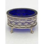 A small silver blue glass lined pot, hallmarked London 1897