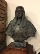 A large Bronze bust of a Judge on a mahogany plinth by Allan G Wyon