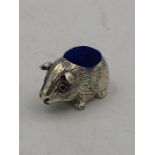 A Silver pincushion in the form of a Guinea Pig