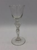 An Art Deco erotic wine glass