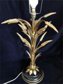 A metal wheat themed lamp base
