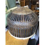 A large metal Light shade or planter