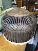 A large metal Light shade or planter