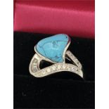 A Silver CZ and Turquoise heart shaped dress ring