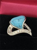 A Silver CZ and Turquoise heart shaped dress ring