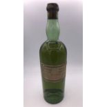 A Bottle of Vintage L Garnier Chartreuse liqueur 96 proof.