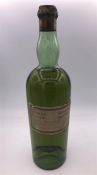 A Bottle of Vintage L Garnier Chartreuse liqueur 96 proof.