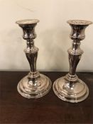 A pair of silver plated candlesticks