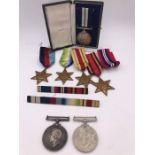 A medal group awarded to W A Cleghorn MX 47130 CEA HMS Vernon 1939-45 War Medal, Long Service and