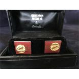 A pair of boxed Rennie Mackintosh cufflinks