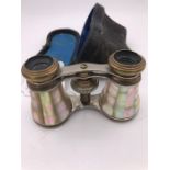 A cased set of mother and pearl 19th Century opera glasses