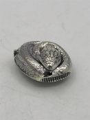 An unusual silver snake shaped vesta case