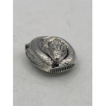 An unusual silver snake shaped vesta case