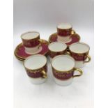 Six Aynsley Coffee cans, Maple London with a red and gold design.
