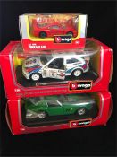 A selection of three Burago vehicles, Ferrari F40, Ford Escort RS Cosworth Rally, and Ferrari 250