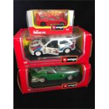 A selection of three Burago vehicles, Ferrari F40, Ford Escort RS Cosworth Rally, and Ferrari 250