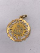 An 18ct gold medallion (4.3g)