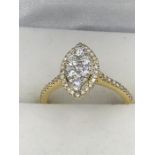 A Good 18ct yellow gold diamond cluster ring of 55 points