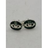 A Pair of silver and enamel set Welsh style cufflinks