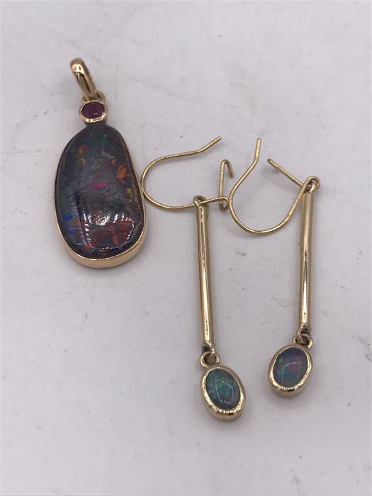 14ct Gold Black Opal pendant with ruby and matching opal earrings